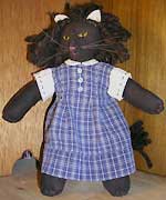 toy lion dressed as a schoolgirl